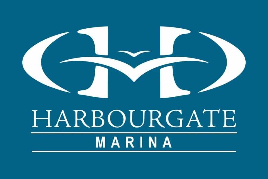 Logo for Harbourgate Marina featuring stylized white "H" and "M" with a bird shape, set against a teal background, with "HARBOURGATE MARINA" written below in white uppercase letters.