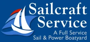 Logo for Sailcraft Service featuring a stylized sailboat and text stating, "A Full Service Sail & Power Boatyard," on a blue background.